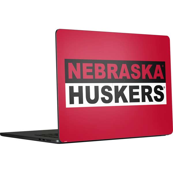 https://www.skinit.com/cdn/shop/products/red-nebraska-huskers-macbook-air-15-in-_2023_-skin-1687826652_SKNNEBHSK05MA1523-PR-01_600x.jpg?v=1690227148